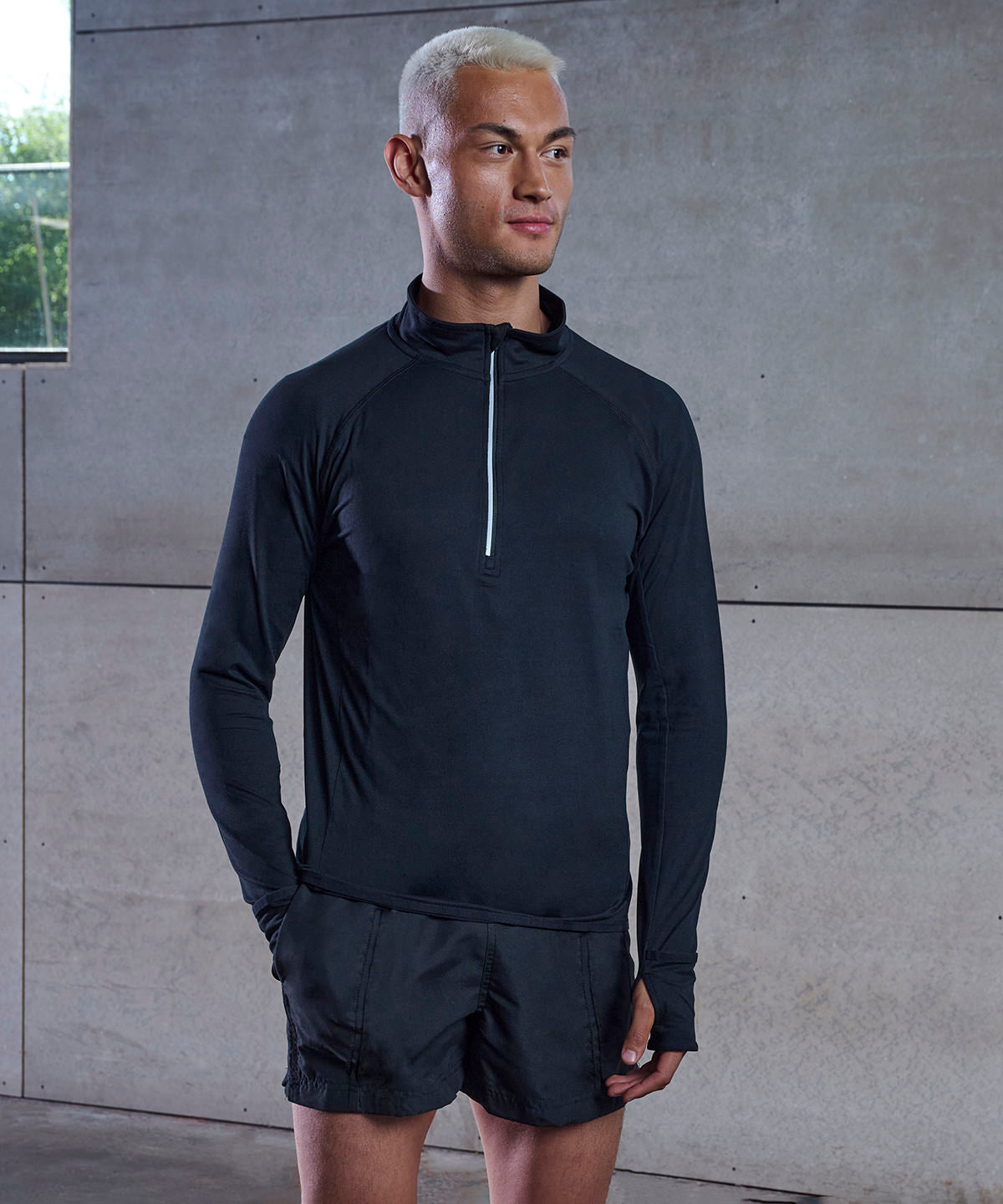 Long-sleeved ¼ zip top